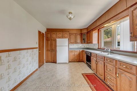 Photo 5 at 201 Thistle Down Boulevard, Beaumonde Heights, Toronto