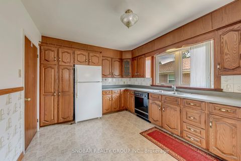 Photo 6 at 201 Thistle Down Boulevard, Beaumonde Heights, Toronto