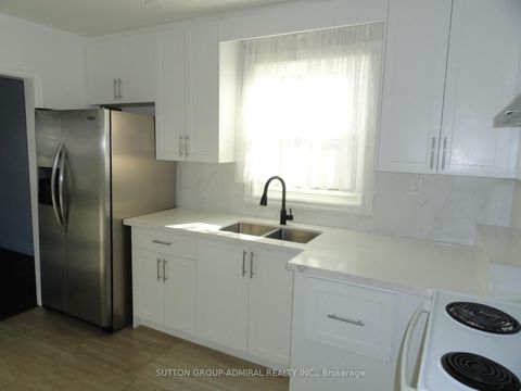 Photo 3 at 30 Merrian Road, Kennedy Park, Toronto