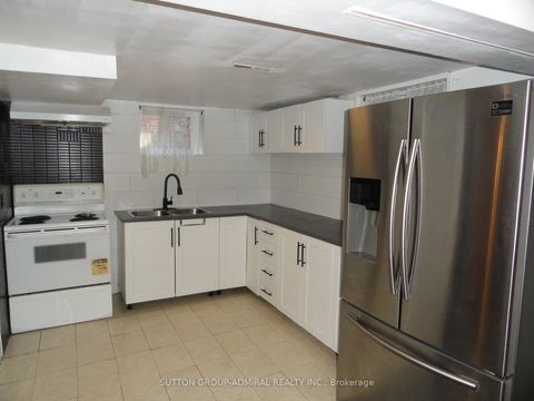 Photo 9 at 30 Merrian Road, Kennedy Park, Toronto