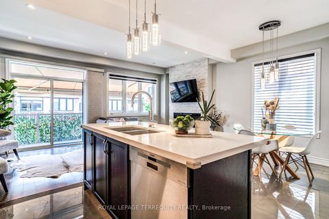 Photo 10 at 132 Thomas Fisher Drive, City Centre West, Toronto
