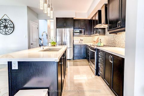 Photo 11 at 132 Thomas Fisher Drive, City Centre West, Toronto