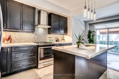 Photo 12 at 132 Thomas Fisher Drive, City Centre West, Toronto