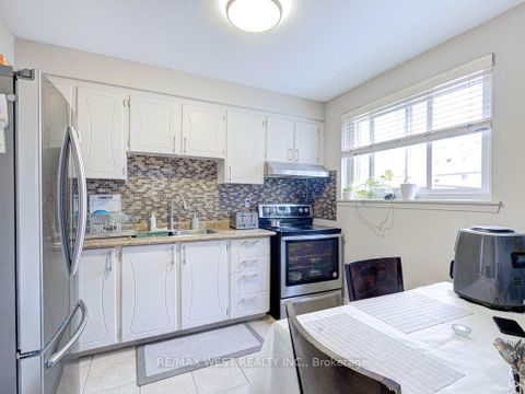 Photo 2 at 22 - 83 Irwin Road, Old Rexdale, Toronto