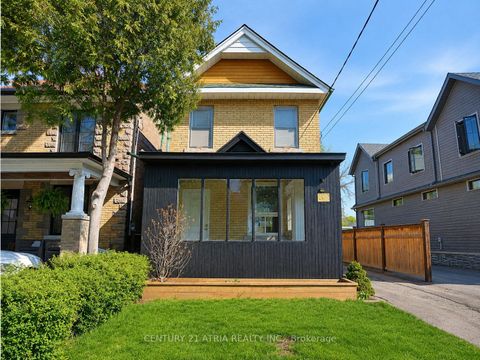 Photo 1 at 32 Rosevear Avenue, Crescent Town, Toronto