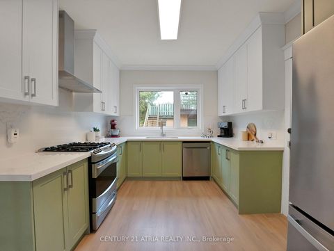 Photo 11 at 32 Rosevear Avenue, Crescent Town, Toronto