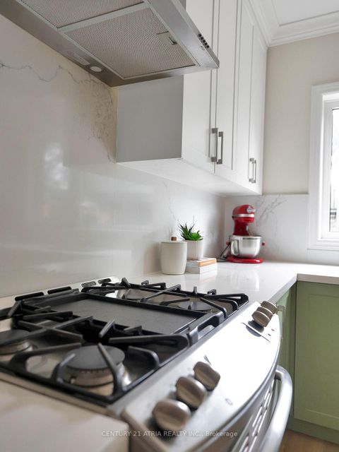 Photo 12 at 32 Rosevear Avenue, Crescent Town, Toronto