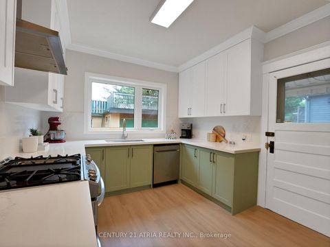 Photo 13 at 32 Rosevear Avenue, Crescent Town, Toronto