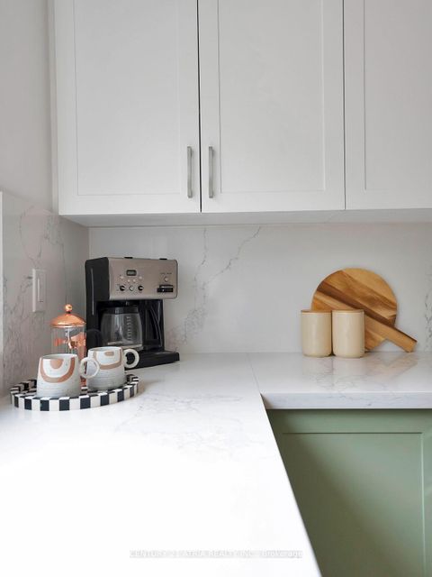 Photo 14 at 32 Rosevear Avenue, Crescent Town, Toronto