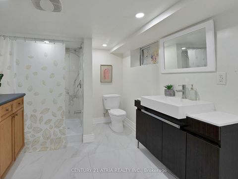 Photo 32 at 32 Rosevear Avenue, Crescent Town, Toronto