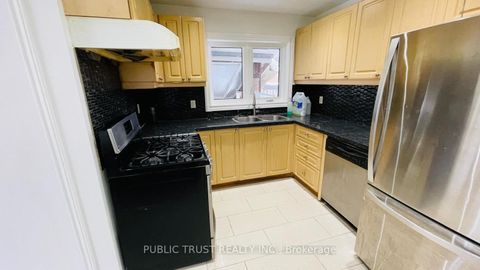 Photo 2 at 3818 Lawrence Avenue E, Woburn, Toronto