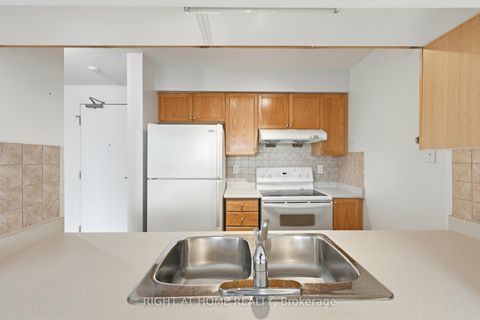 Photo 11 at 727 - 18 Mondeo Drive, Dorset Park, Toronto