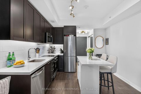 Photo 8 at 401 - 1 Neighbourhood Lane, Queensway, Toronto