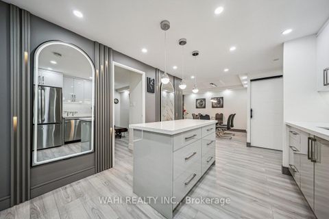 Photo 3 at 1003 - 299 Mill Road, Markland Wood, Toronto