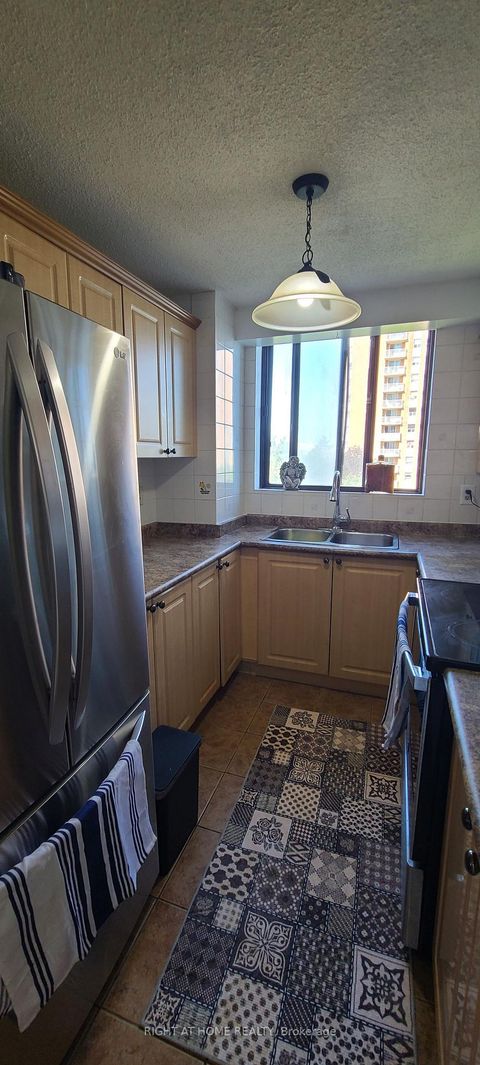 Photo 10 at 405 - 10 TAPSCOTT Road, Malvern, Toronto