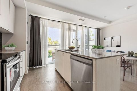 Photo 9 at 4 - 60 George Butchart Drive, CFB, Toronto