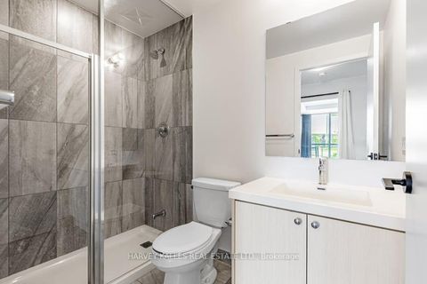 Photo 15 at 4 - 60 George Butchart Drive, CFB, Toronto