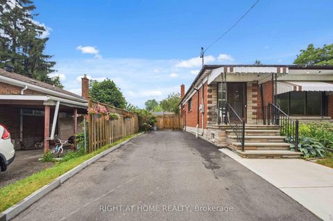 Photo 2 at 8 Grassington Crescent, Woburn, Toronto