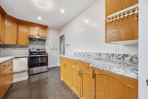 Photo 10 at 8 Grassington Crescent, Woburn, Toronto