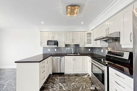 Photo 10 at 220 - 83 Mondeo Drive, Dorset Park, Toronto