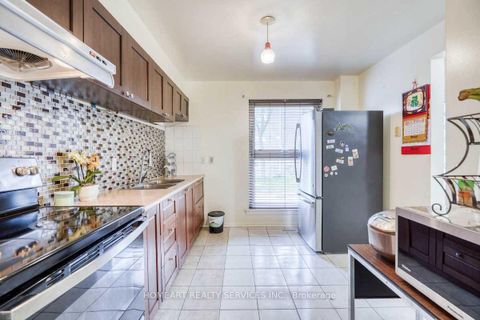 Photo 10 at 1 - 27 Gosford Boulevard, Black Creek, Toronto