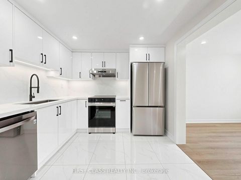 Photo 5 at 38 - 850 Huntingwood Drive, L'Amoreaux, Toronto