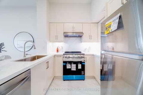 Photo 4 at 218 - 1038 Mcnicoll Avenue, Steeles, Toronto