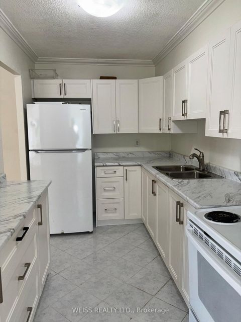 Photo 2 at 310 - 1801 O'Connor Drive, Victoria Village, Toronto