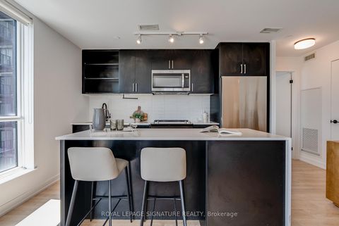 Photo 1 at 517 - 2300 St. Clair Avenue W, Junction Area, Toronto
