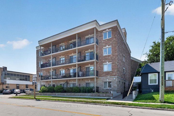 Photo 1 at 202 - 73 Washington Avenue, CO Central, Oakville