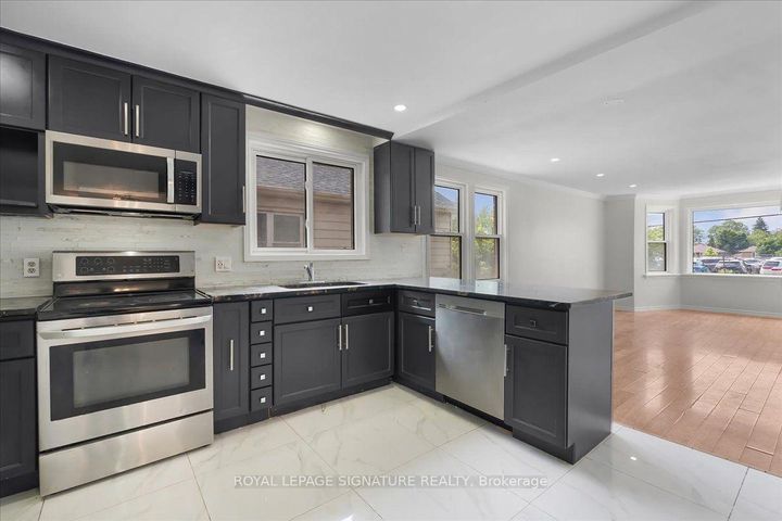Photo 6 at 195 Park Road S, Vanier, Oshawa