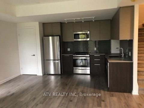 Photo 2 at TH17 - 10 Brin Drive, Humber Valley, Toronto