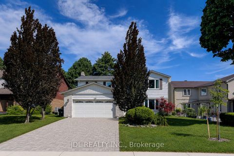 Photo 1 at 20 Mossgrove Trail, Windfields, Toronto