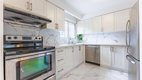 Photo 7 at 102 Jenny Wrenway Way, Hillcrest Village, Toronto