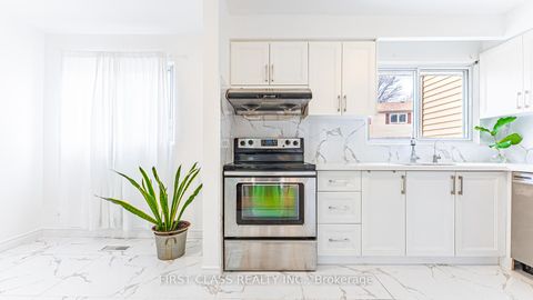 Photo 8 at 102 Jenny Wrenway Way, Hillcrest Village, Toronto