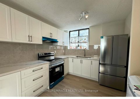 Photo 1 at 303 - 665 Kennedy Road, Kennedy Park, Toronto