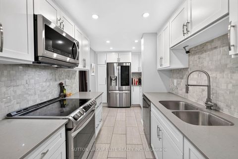 Photo 11 at 2010 - 820 Burnhamthorpe Road, Markland Wood, Toronto
