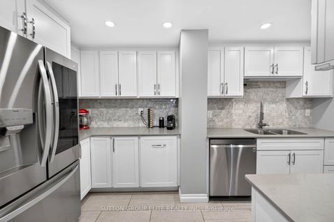 Photo 13 at 2010 - 820 Burnhamthorpe Road, Markland Wood, Toronto