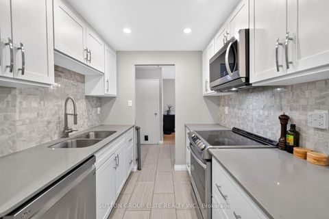Photo 14 at 2010 - 820 Burnhamthorpe Road, Markland Wood, Toronto