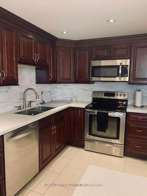 Photo 1 at 303 - 500 Glencairn Avenue, Lawrence, Toronto