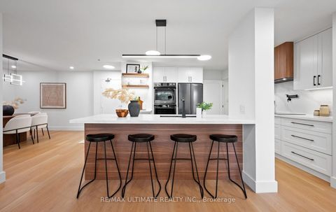 Photo 12 at 204 - 275 Bamburgh Circle, Steeles, Toronto