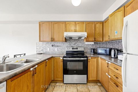 Photo 9 at 121 Jenkinson Way, Dorset Park, Toronto