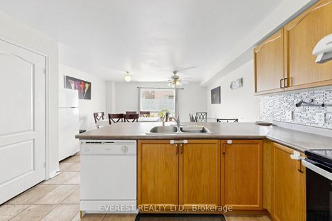 Photo 10 at 121 Jenkinson Way, Dorset Park, Toronto