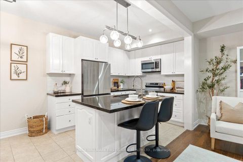 Photo 10 at 53F Dentonia Park Avenue, Crescent Town, Toronto