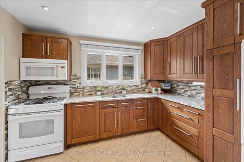Photo 10 at 970 Timmins Gardens, West Shore, Pickering
