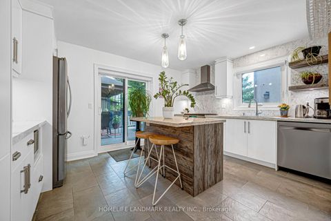 Photo 15 at 15 Denton Avenue, Crescent Town, Toronto