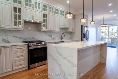 Photo 3 at 229B Mcintosh Street, Cliffside, Toronto