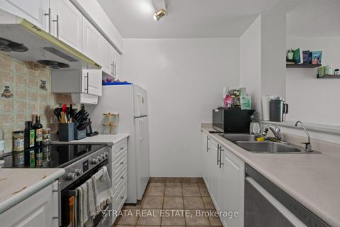 Photo 7 at 313 - 1 Lee Centre Drive, Woburn, Toronto