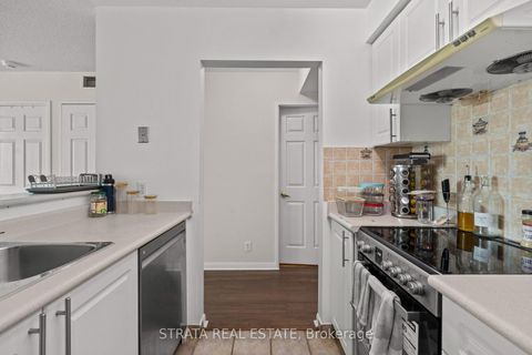 Photo 8 at 313 - 1 Lee Centre Drive, Woburn, Toronto