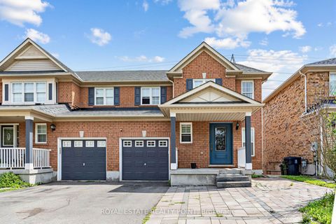 Photo 1 at 141 Raponi Circle, Rouge E11, Toronto